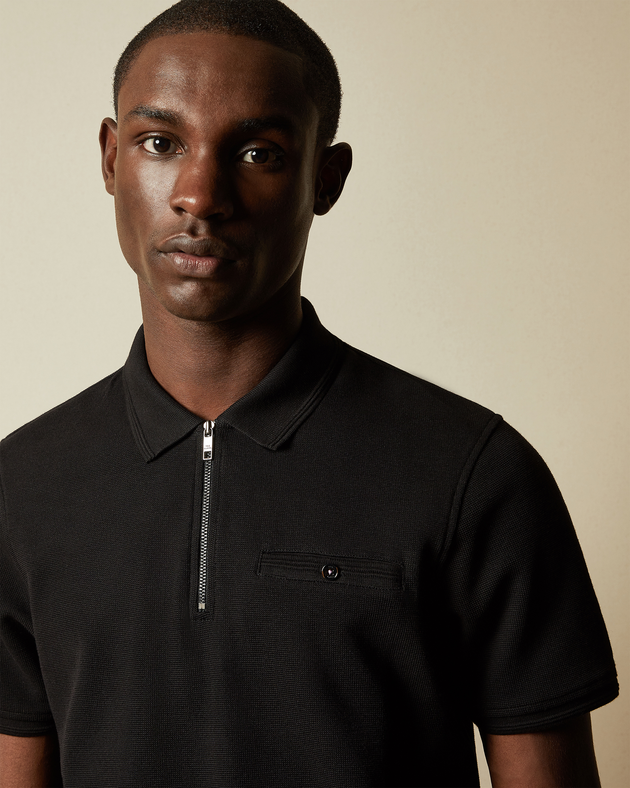 black polo shirt zipped