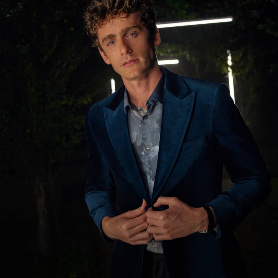 Man in a blue velvet suit