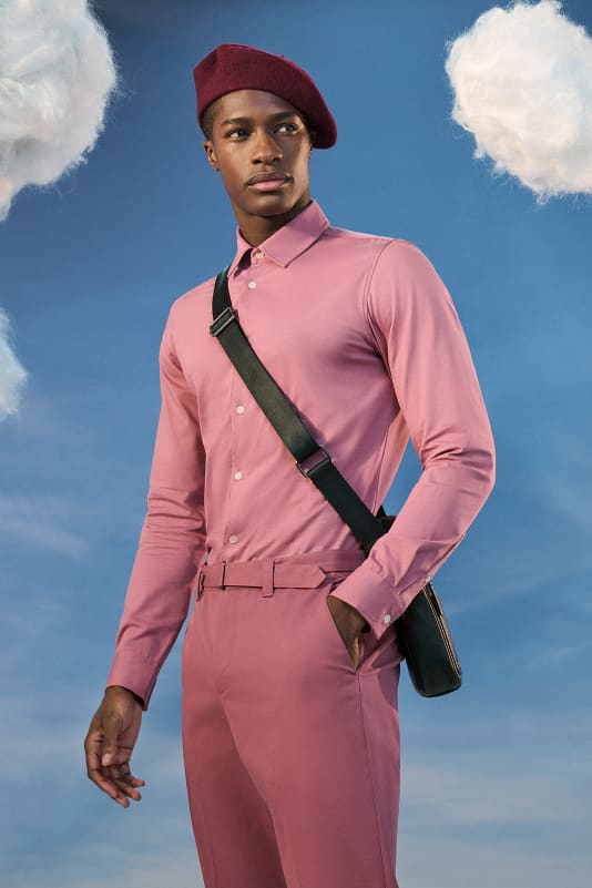 Man in a pink shirt wearing pink trousers