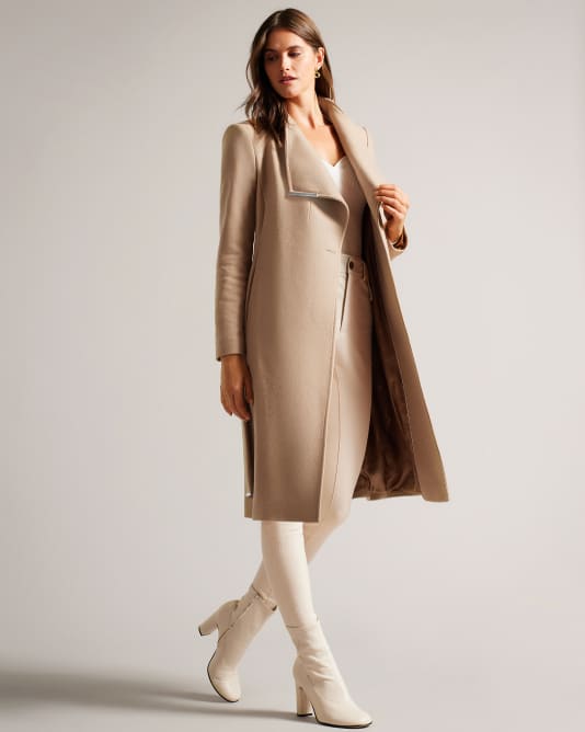 Woman in a beige coat