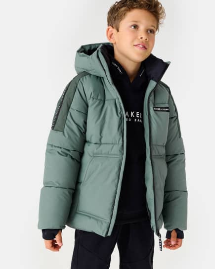 Boy in khaki coat
