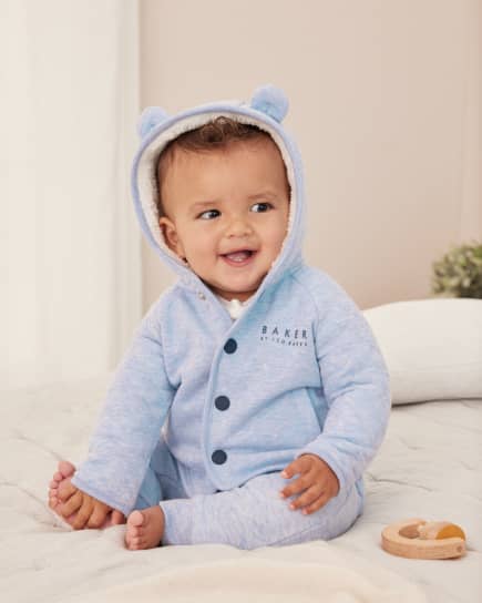 Baby in a blue quilted set