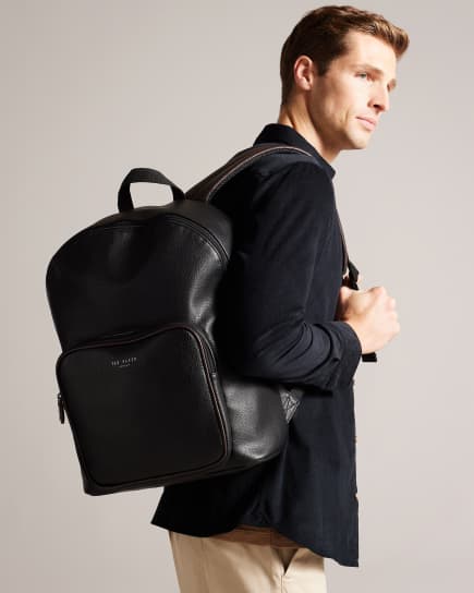 Man carrying backpack