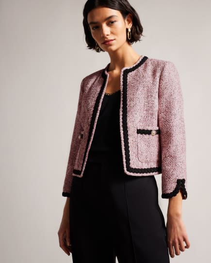 Woman wearing a pink blazer