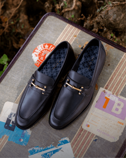 Men's pair of black leather loafers