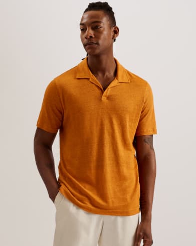 Man in orange polo top