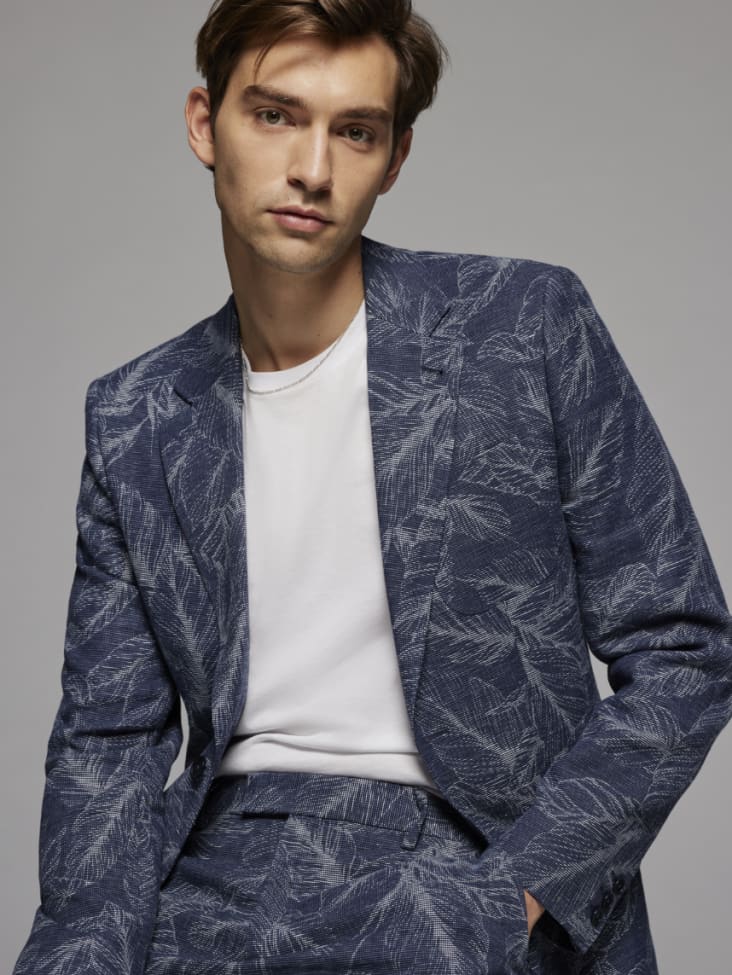 Man in a blue pattern suit