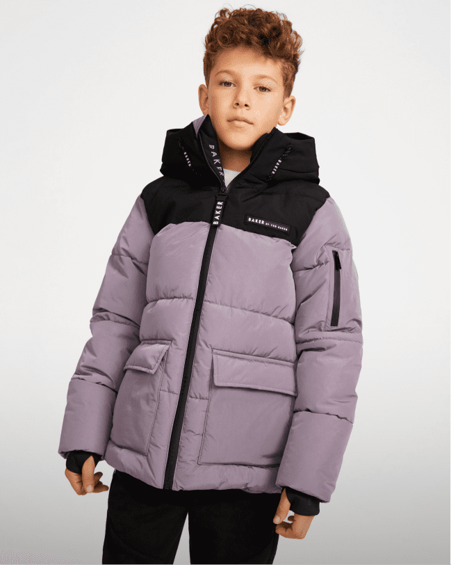 Older boy in purple coat