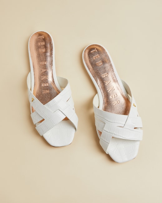 all white flat sandals
