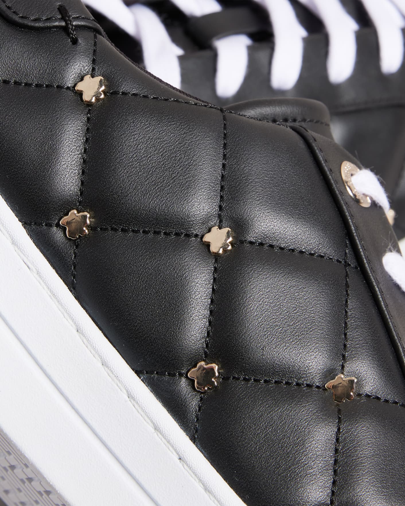 Black Quilted Trainers with Magnolia Studs Ted Baker
